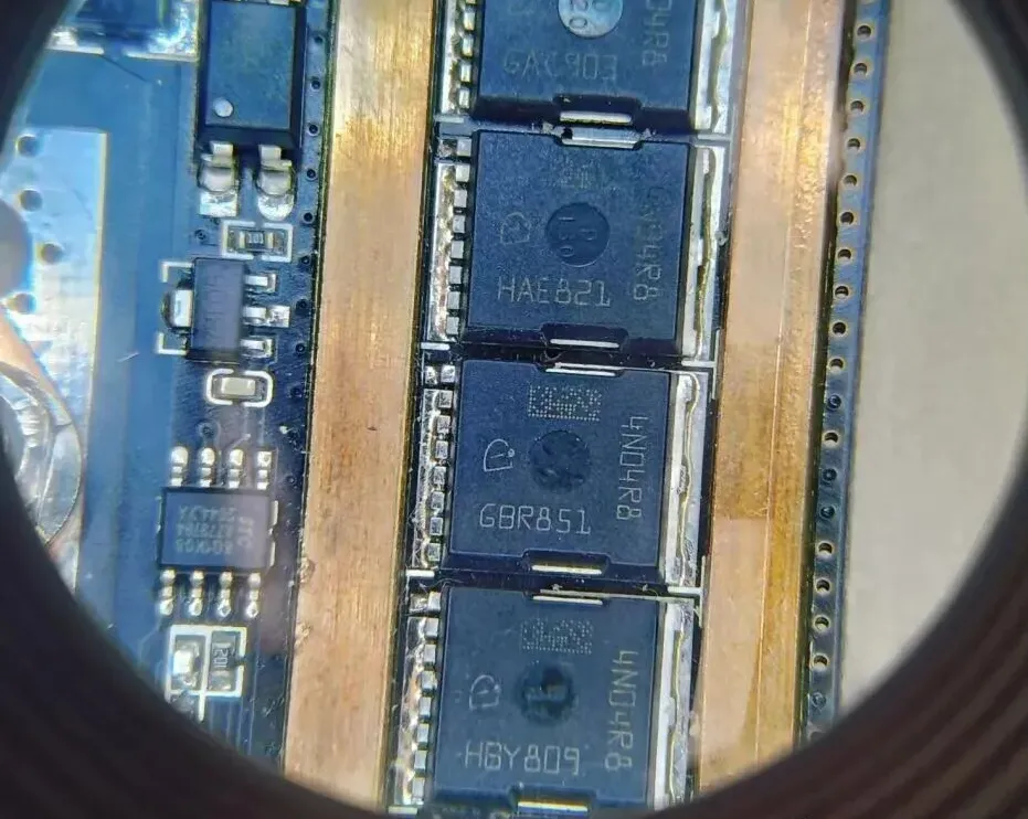 Close-up of power MOSFET array highlighting ultra-low resistance parallel paths for high-current PCB applications