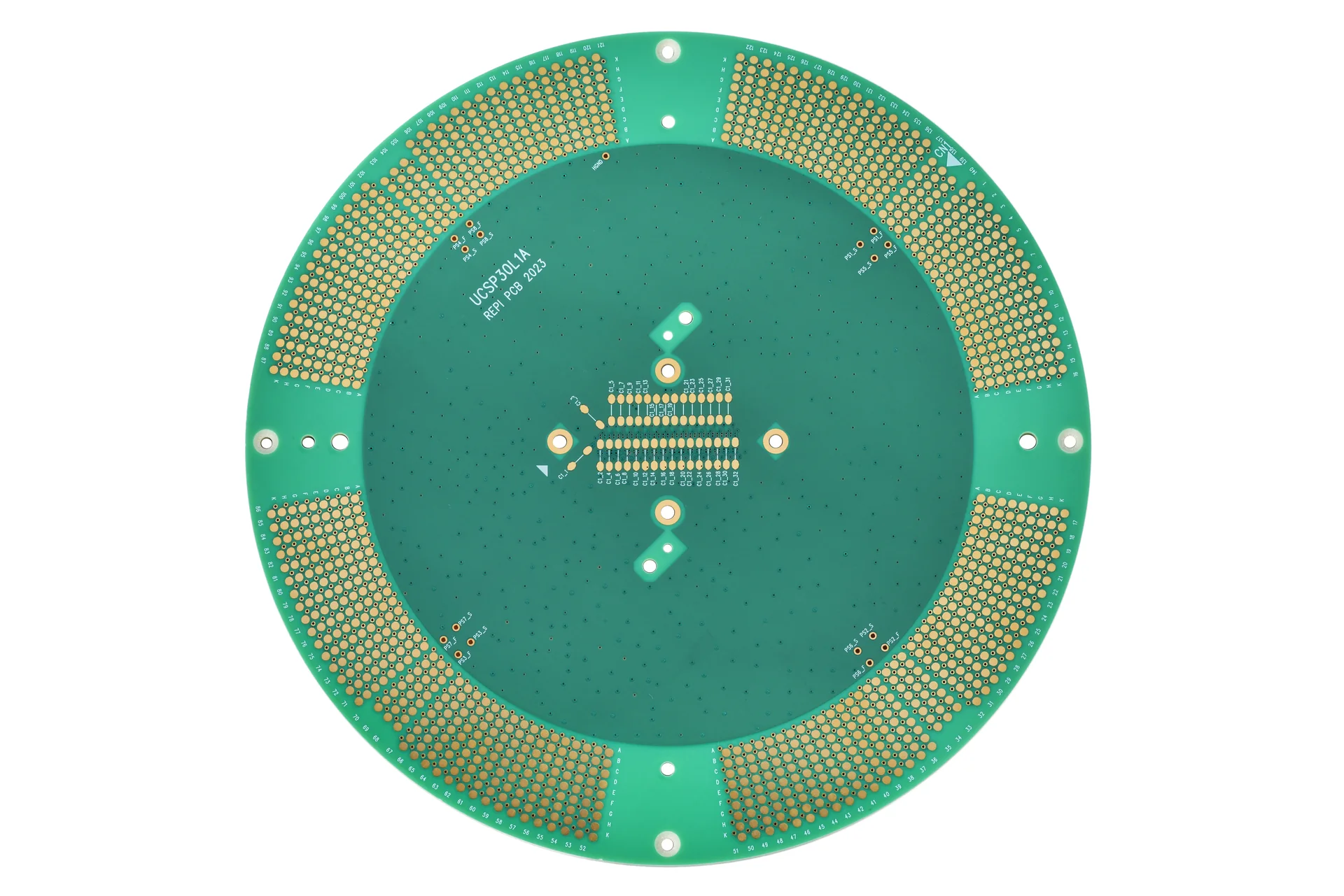 Round green multilayer test PCB with many edge pads, mounting holes and a central component pad area