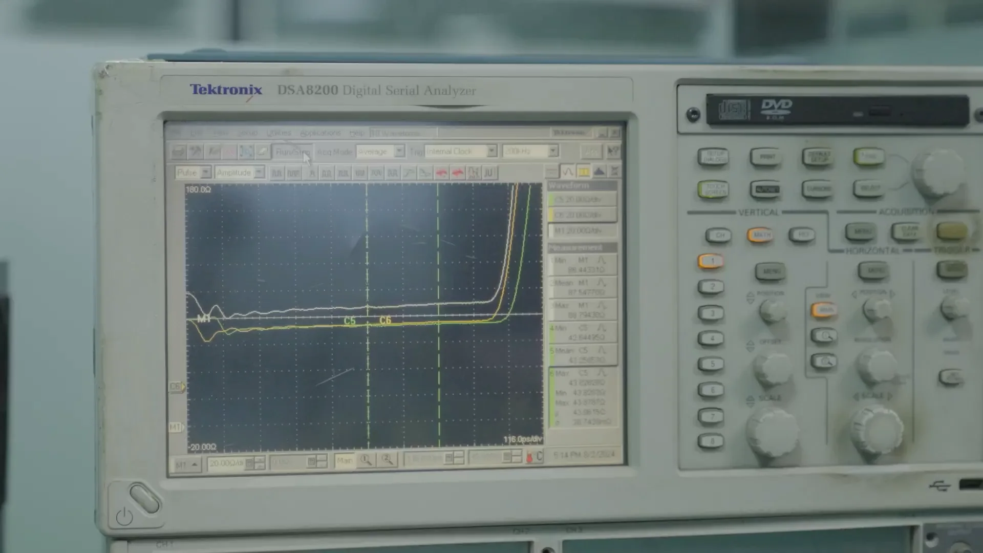 Close-up of a Tektronix instrument screen displaying impedance traces and measurement cursors.