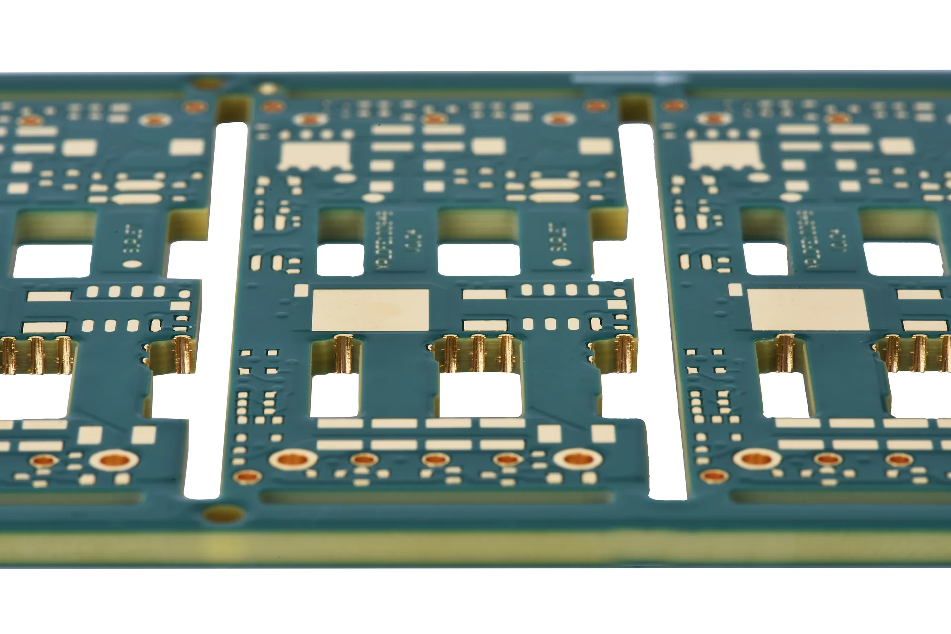 a bare circuit board with large metal areas, routed slots, and fine component lands. A bare circuit board with large metal areas, routed slots, and fine component lands.